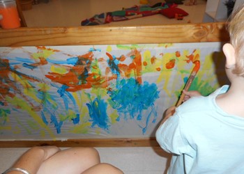 Vertical Surface Drawing in the Toddler Room IMAGE